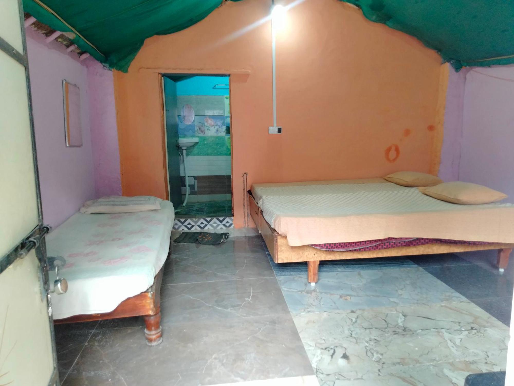 Goldengarden Cottages Hampi Habitación foto